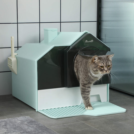Cat using a modern litter box with a transparent door in a tiled room.