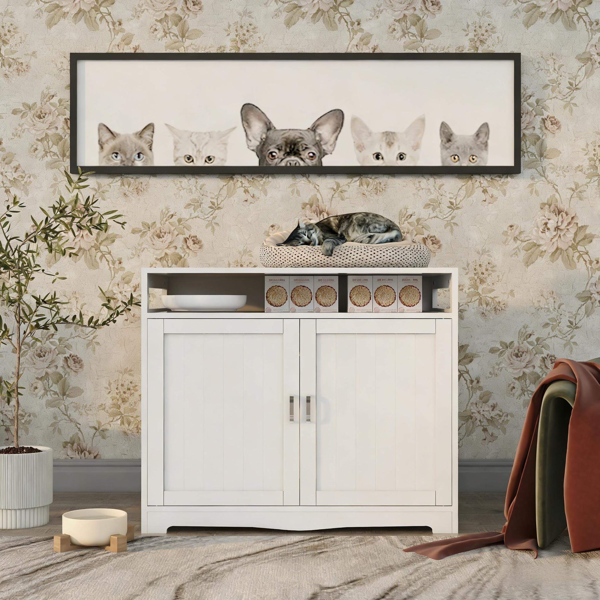 White cabinet with decorative items against a floral wallpapered wall.